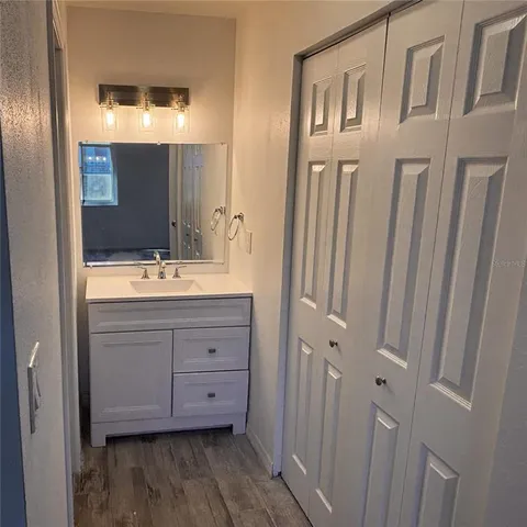 a bathroom with a shower and toilet