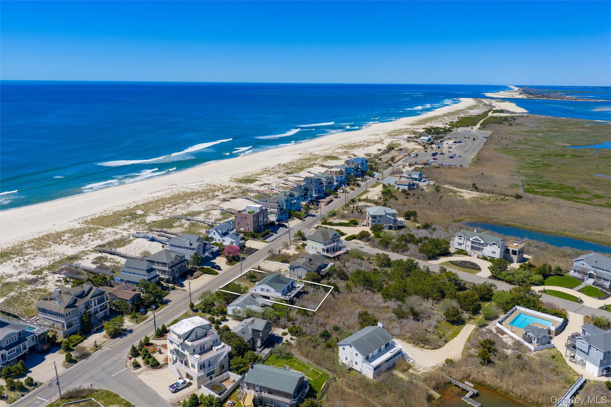 898 Dune Road Westhampton Beach, NY 11978 - Photo 19 of 36 a view of an ocean and beach