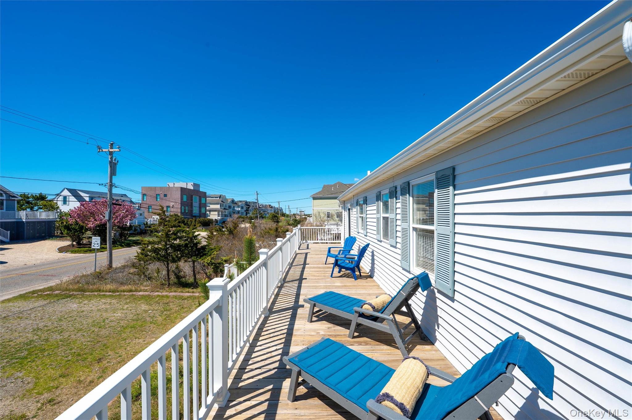 898 Dune Road Westhampton Beach, NY 11978 - Photo 33 of 36 a terrace with outdoor seating and city view
