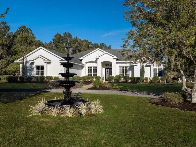 a house view with a garden space