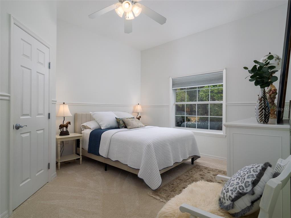 14335 North US Highway 441 Citra, FL 32113 - Photo 18 of 40 a bedroom with a bed and a window