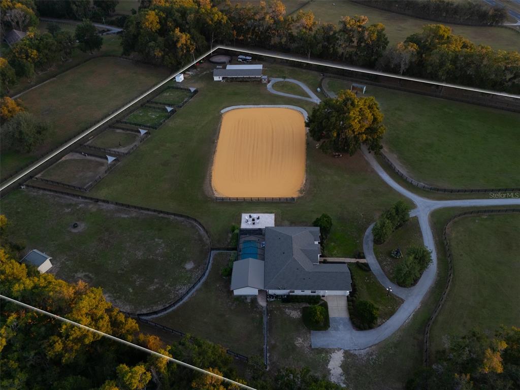 14335 North US Highway 441 Citra, FL 32113 - Photo 2 of 40 an aerial view of a house having swimming pool