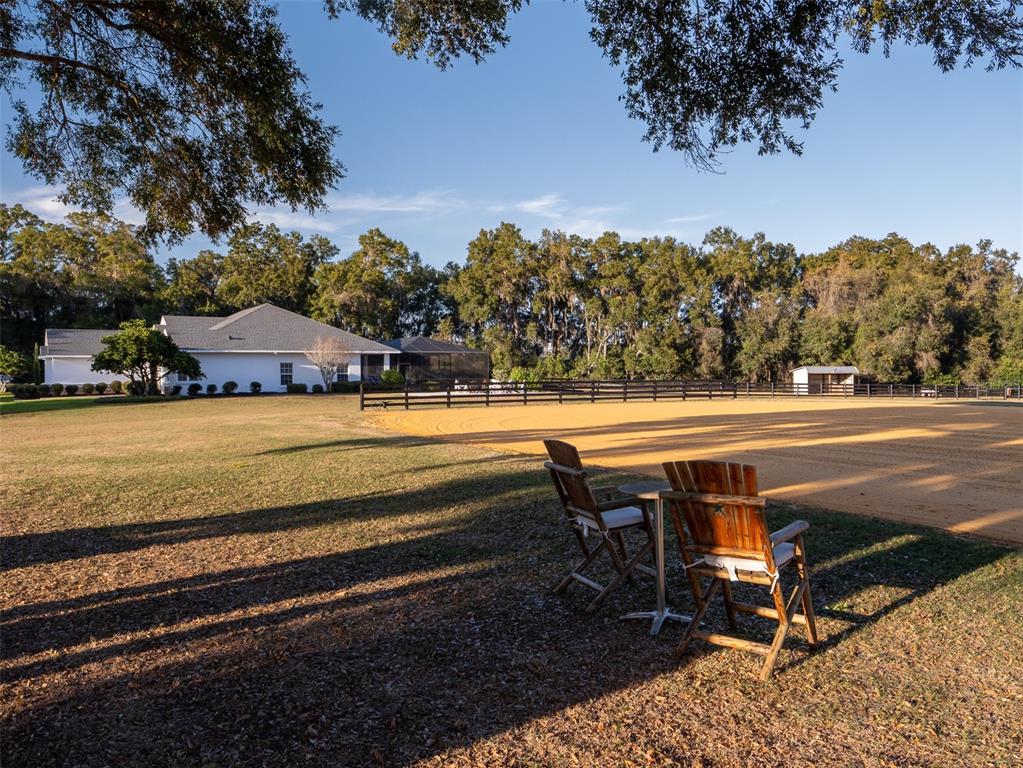 14335 North US Highway 441 Citra, FL 32113 - Photo 28 of 40 a view of a yard with table and chairs