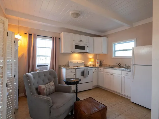 a view of a golf course with a lake