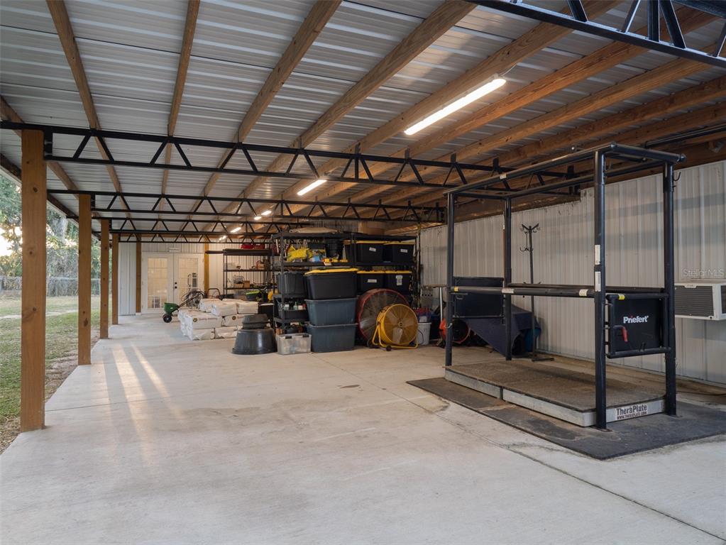 14335 North US Highway 441 Citra, FL 32113 - Photo 37 of 40 a view of a garage with storage