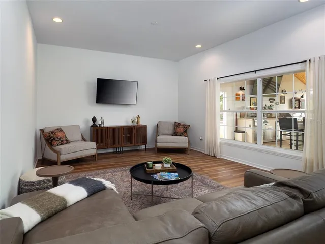 a kitchen with stainless steel appliances granite countertop a sink and stove top oven