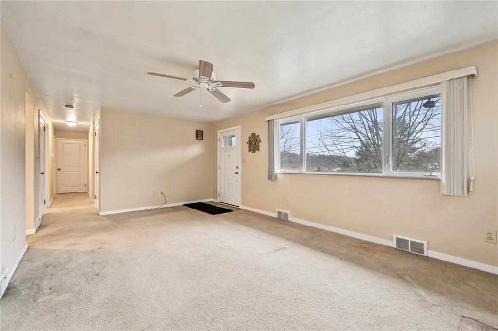 128 Kentzel Road Pittsburgh, PA 15237 - Photo 3 of 21 a view of an empty room with a window