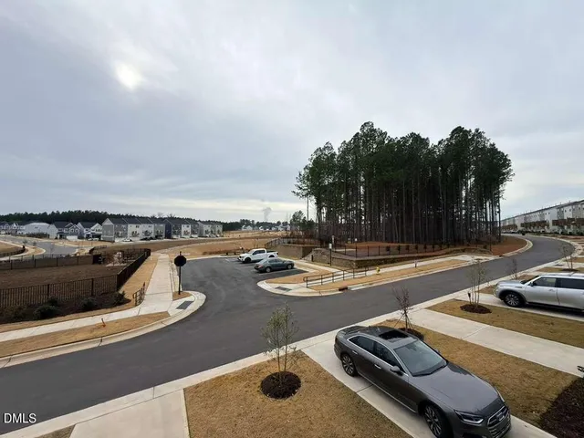 a view of a swimming pool and lounge chairs