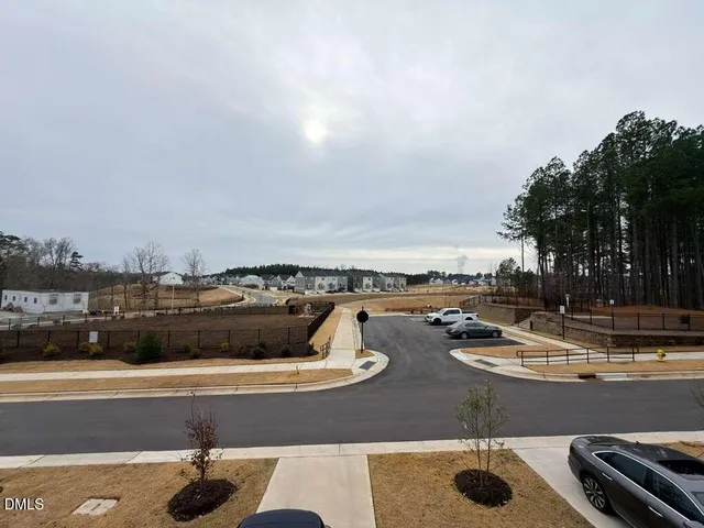 a view of a swimming pool with lounge chair