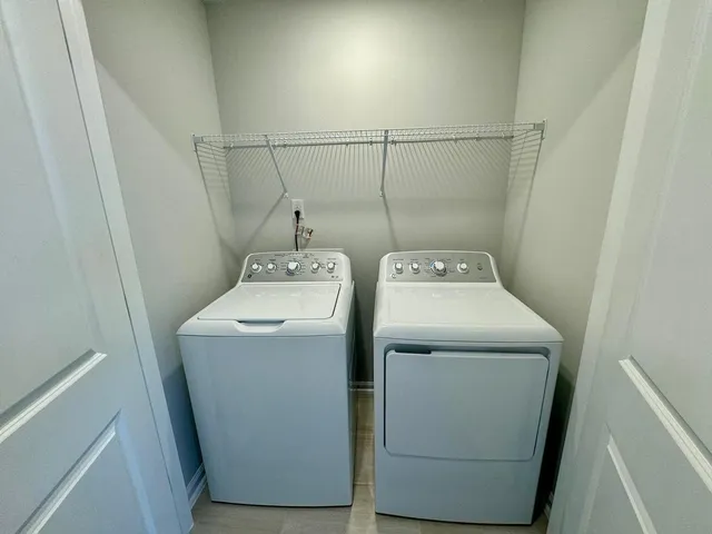 a utility room with dryer and washer