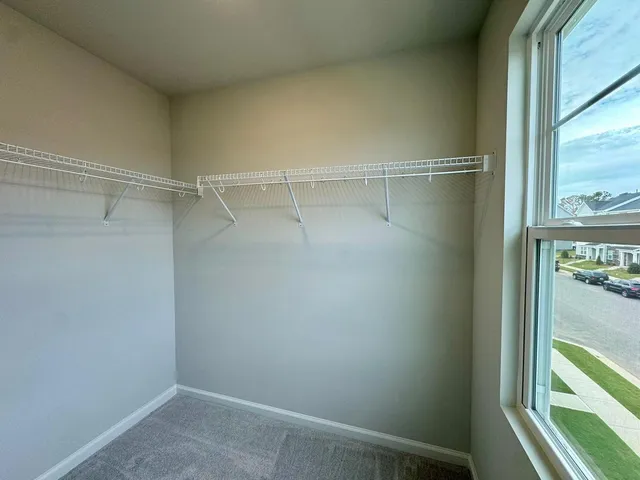 a view of a room with racks on the wall