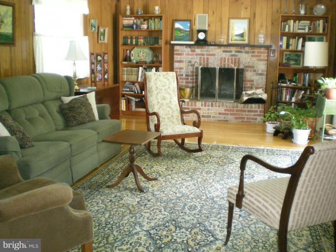 6522 Redgate Circle Baltimore, MD 21228 - Photo 16 of 19 Entertainment size family room with F/P