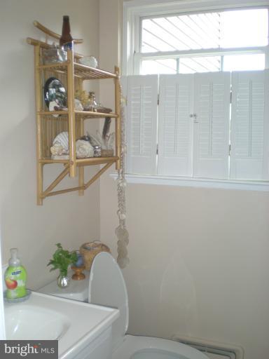 6522 Redgate Circle Baltimore, MD 21228 - Photo 10 of 19 Updated powder room off kitchen