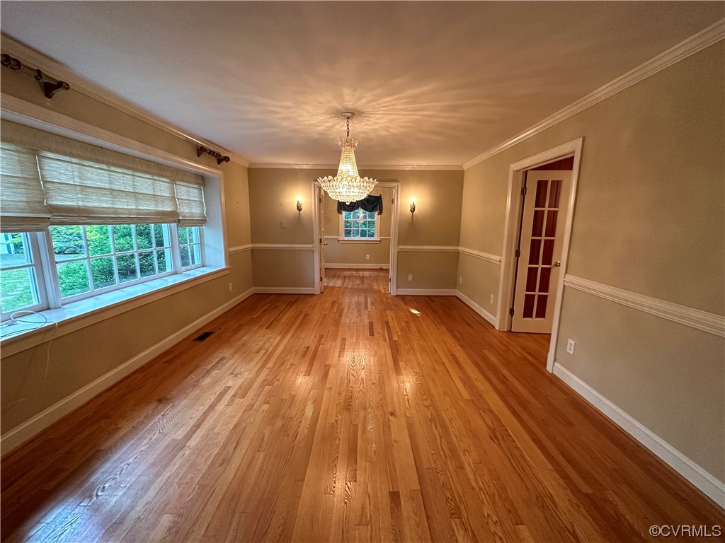 10254 Mannheim Drive Ashland, VA 23005 - Photo 11 of 43 wooden floor in an empty room with a window