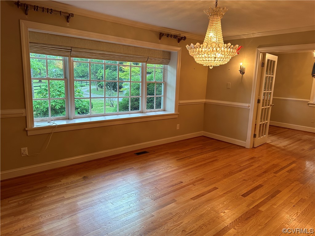10254 Mannheim Drive Ashland, VA 23005 - Photo 13 of 43 a view of a livingroom with wooden floor and a window