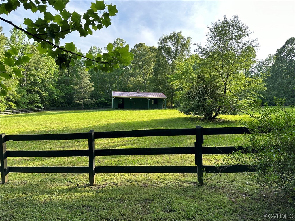 10254 Mannheim Drive Ashland, VA 23005 - Photo 2 of 43 a view of a bench in a garden