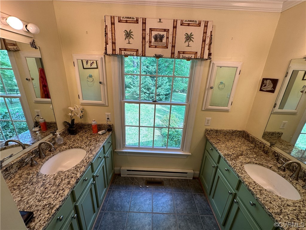10254 Mannheim Drive Ashland, VA 23005 - Photo 25 of 43 a bathroom with a granite countertop sink a toilet a mirror and shower