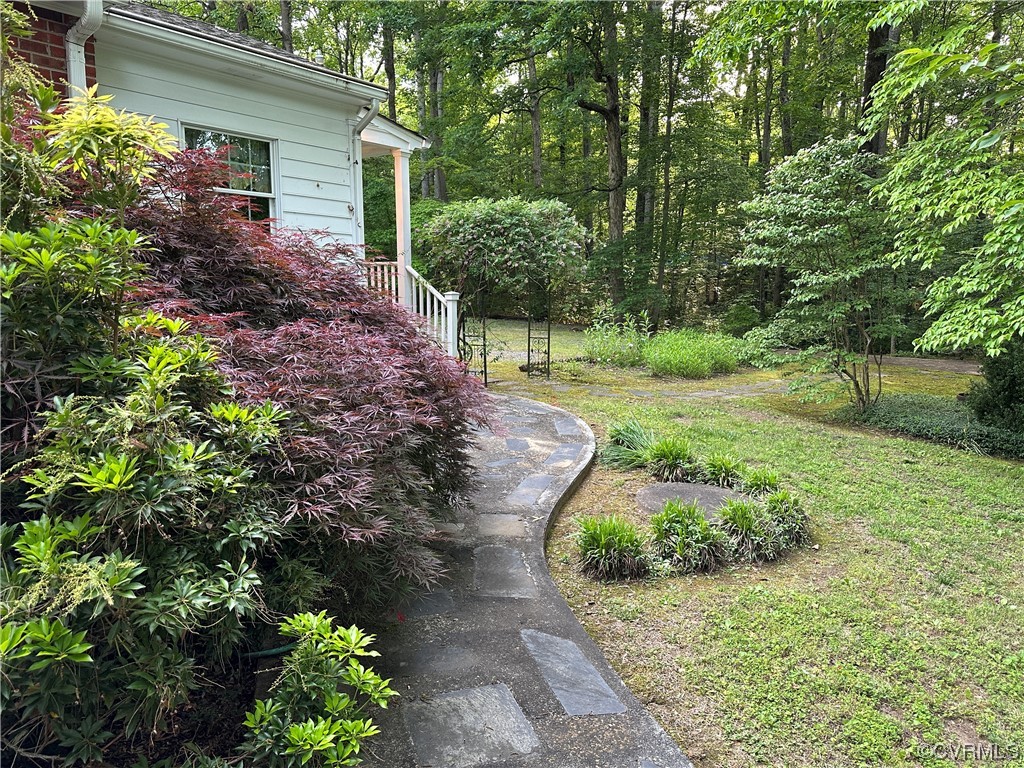 10254 Mannheim Drive Ashland, VA 23005 - Photo 39 of 43 a view of a garden with pathway