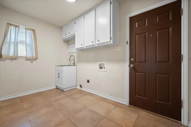 a view of cabinets and window