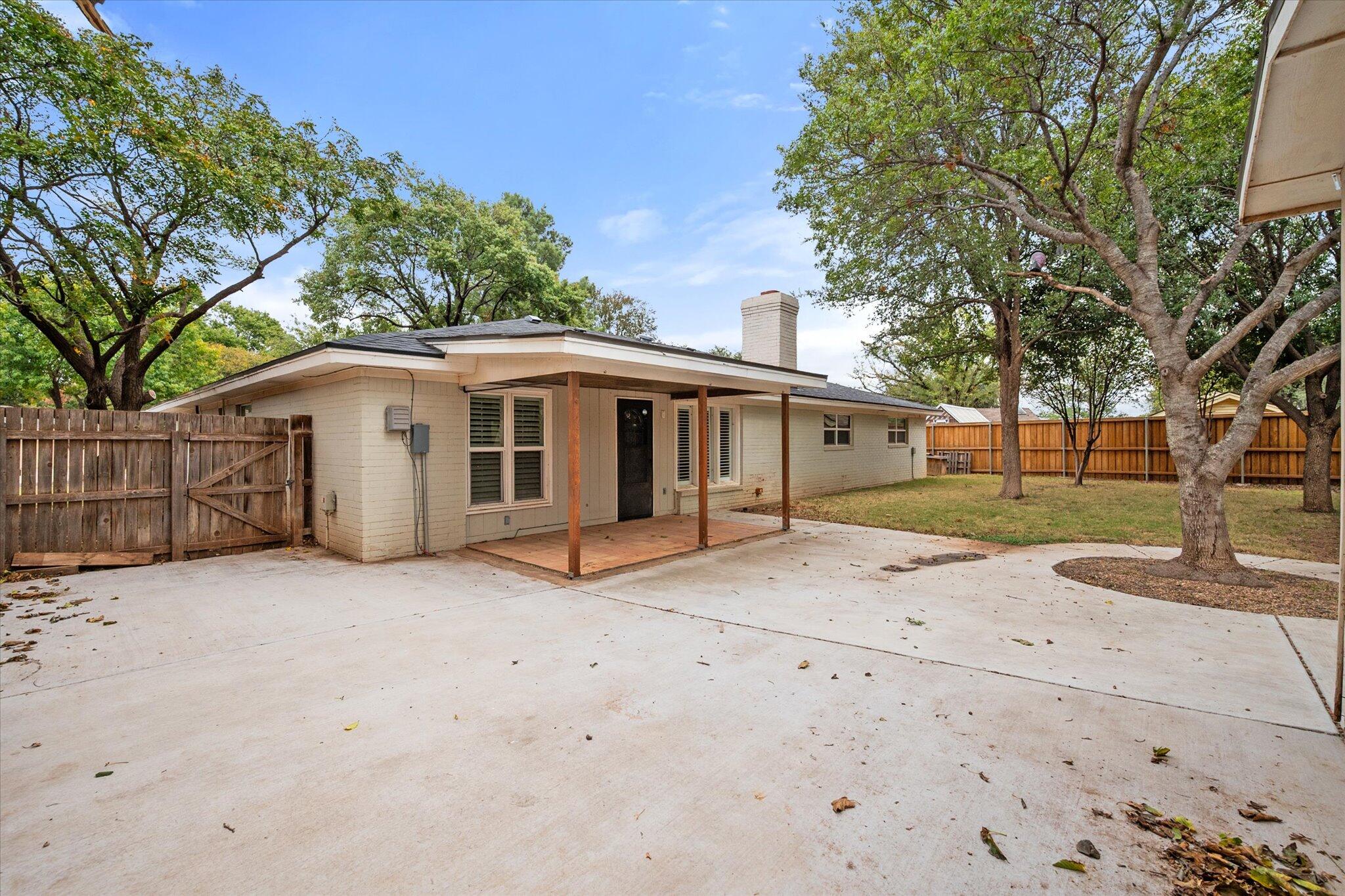 5309 77th Street Lubbock, TX 79424 - Photo 35 of 37 a view of a house with a patio