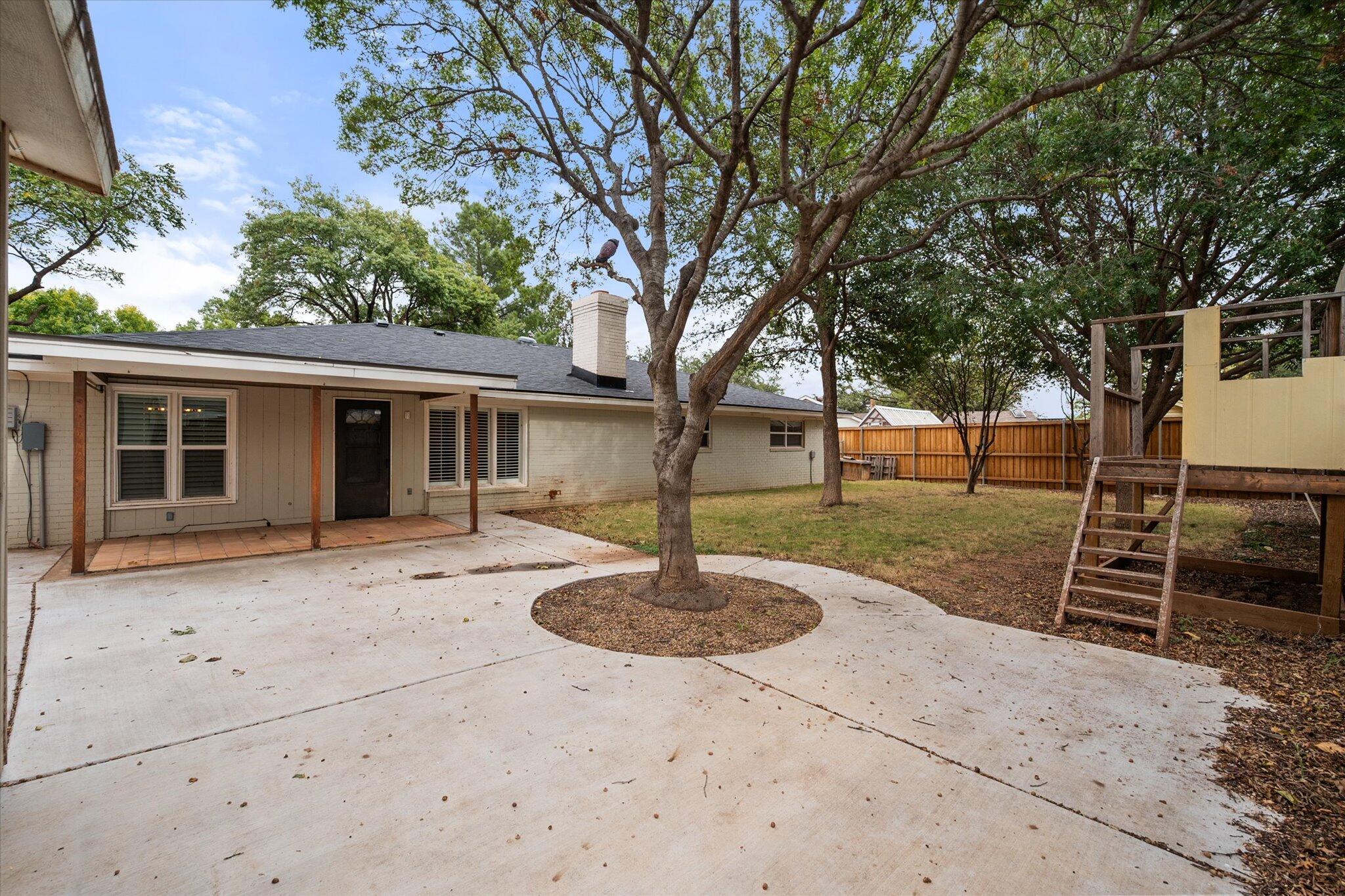 5309 77th Street Lubbock, TX 79424 - Photo 36 of 37 a house view with a garden space