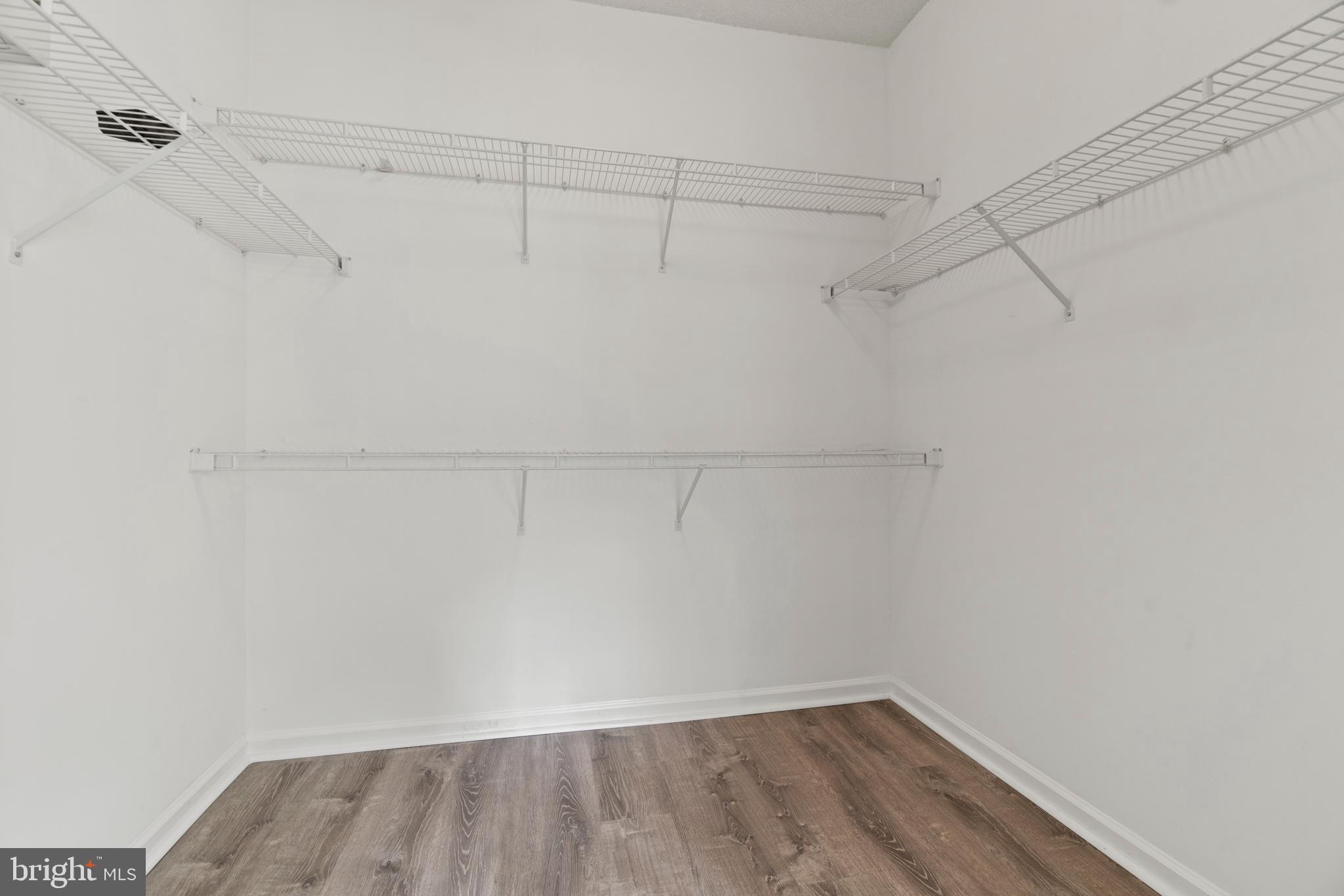 12005 Taliesin Place, Unit 23 Reston, VA 20190 - Photo 25 of 32 Enormous walk-in closet for primary bedroom