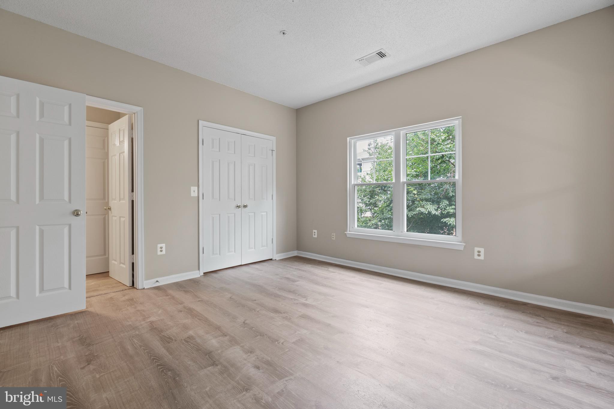 12005 Taliesin Place, Unit 23 Reston, VA 20190 - Photo 26 of 32 Large Primary Bedroom w/EnSuite Bath