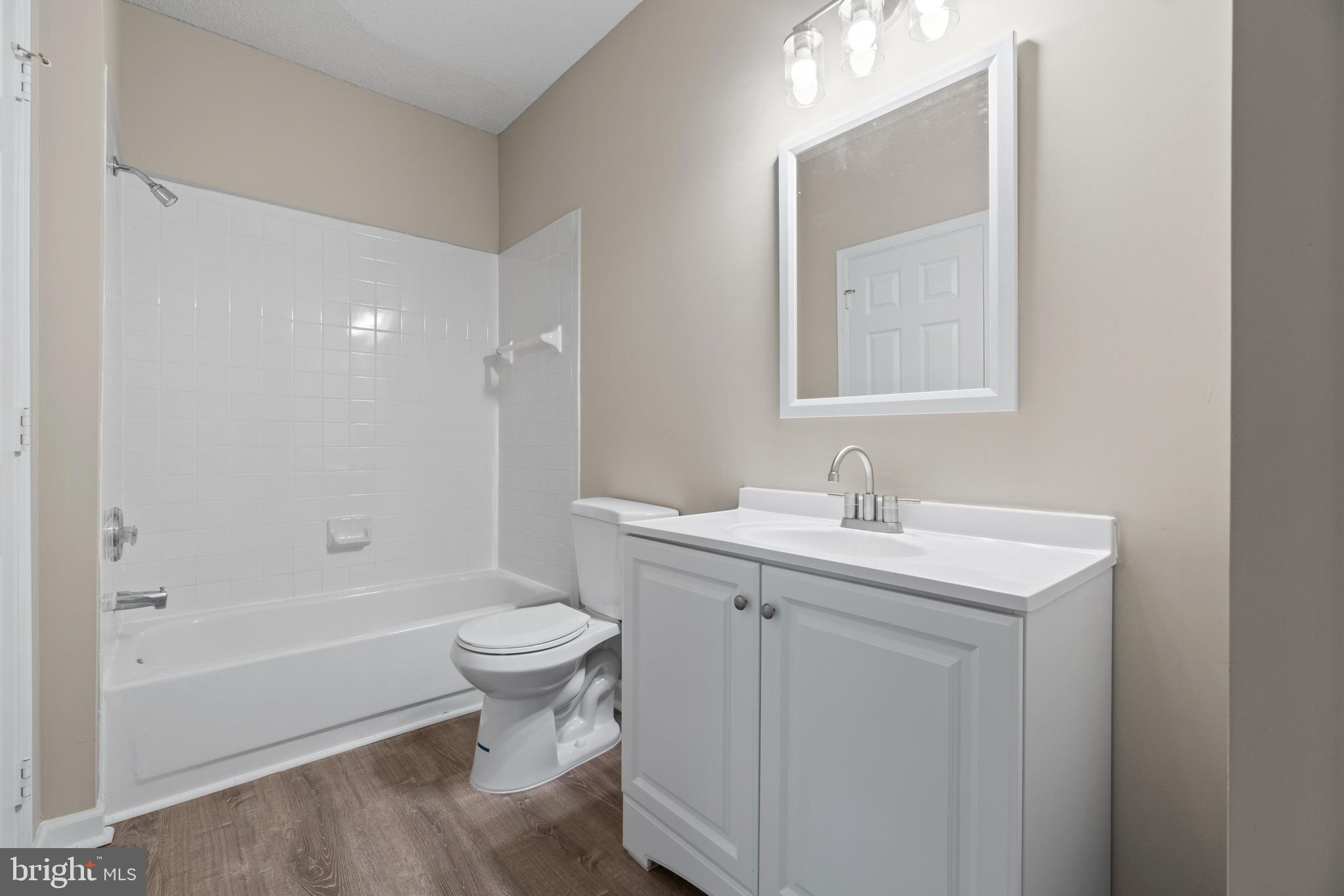 12005 Taliesin Place, Unit 23 Reston, VA 20190 - Photo 28 of 32 Freshly remodeled full bath!