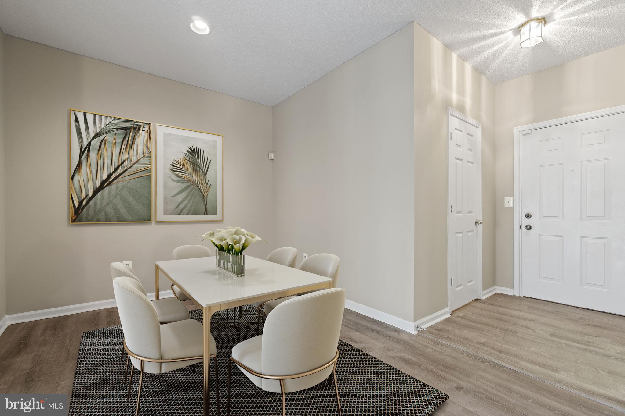 12005 Taliesin Place, Unit 23 Reston, VA 20190 - Photo 5 of 32 Gorgeous luxury vinyl floors (Virtually staged)