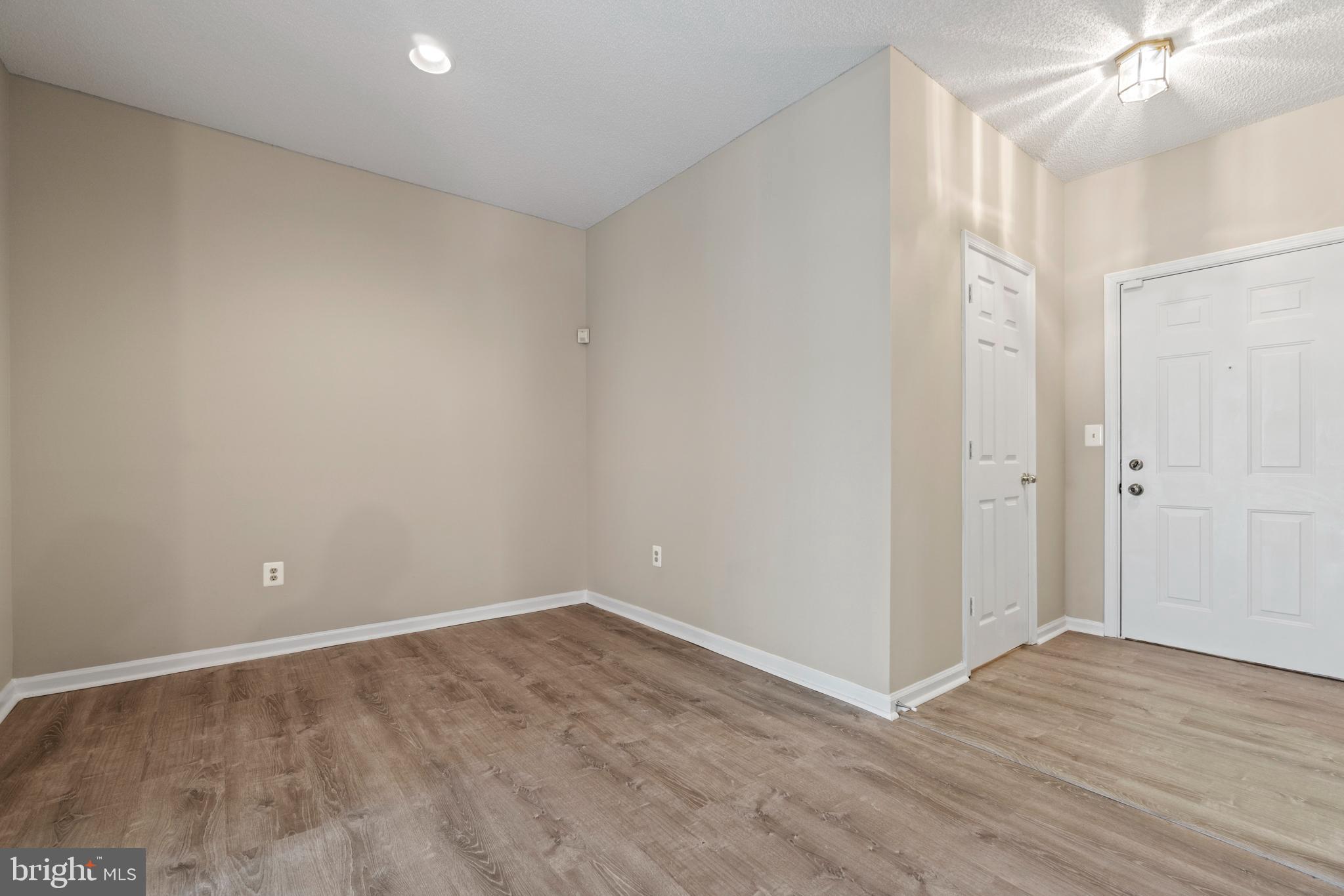 12005 Taliesin Place, Unit 23 Reston, VA 20190 - Photo 6 of 32 Fresh new paint & luxury vinyl plank floors