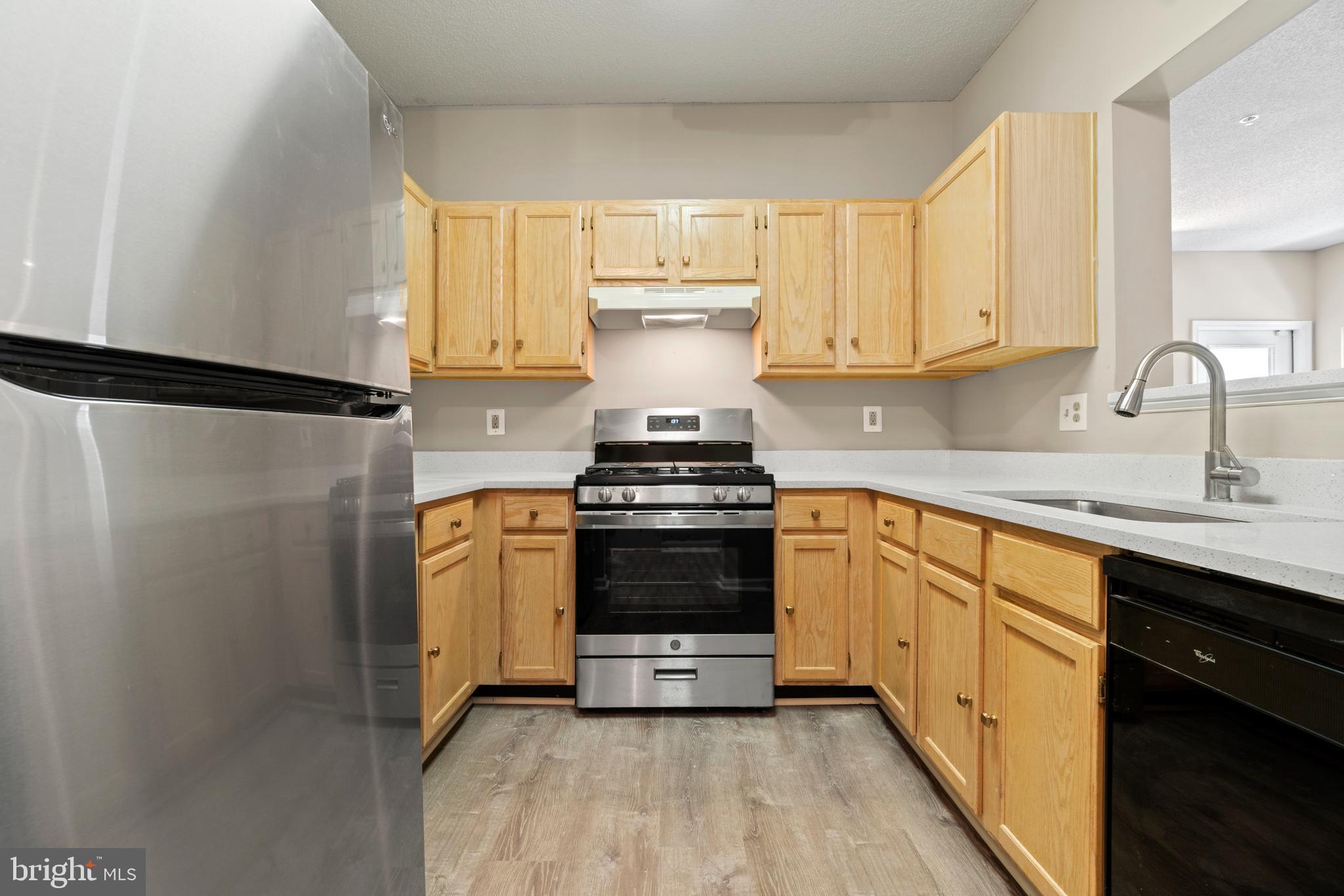 12005 Taliesin Place, Unit 23 Reston, VA 20190 - Photo 8 of 32 Enjoy new appliances!