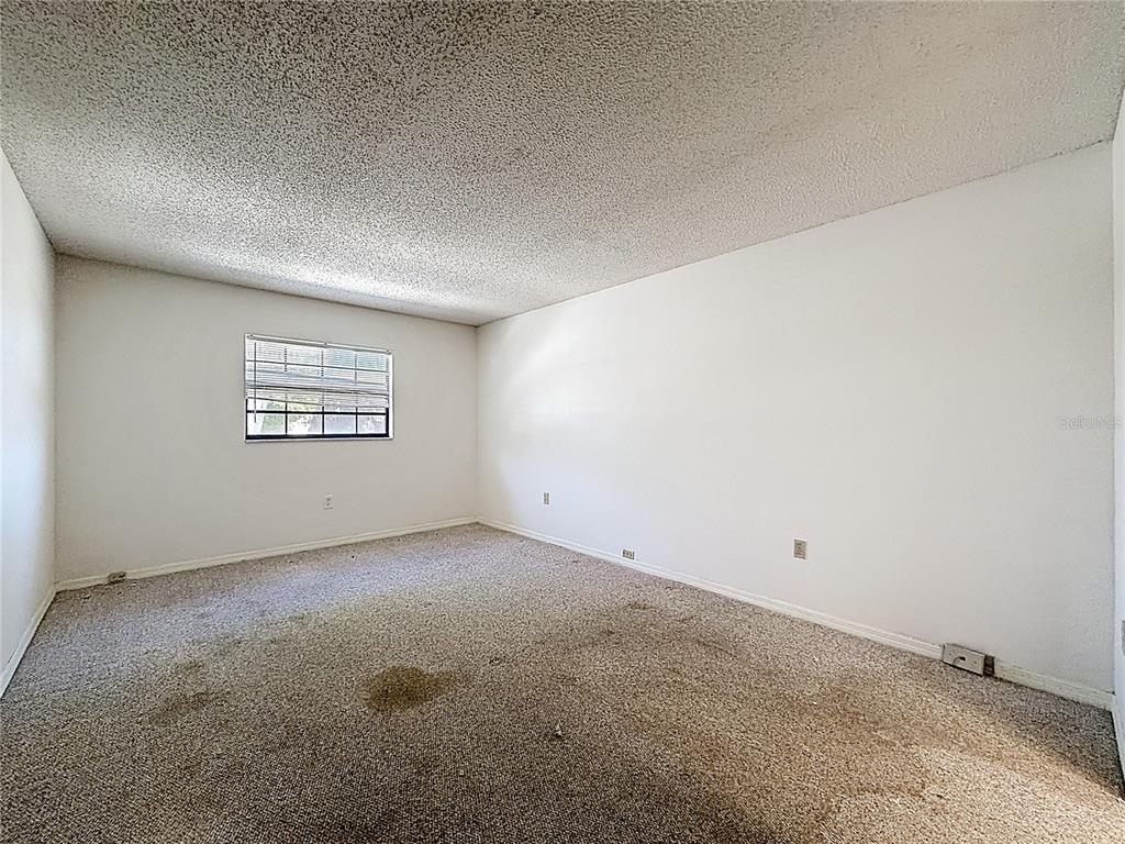500 Newell Hill Road, Unit 108A Leesburg, FL 34748 - Photo 23 of 44 an empty room with a window