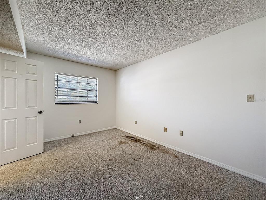 500 Newell Hill Road, Unit 108A Leesburg, FL 34748 - Photo 31 of 44 an empty room with a window