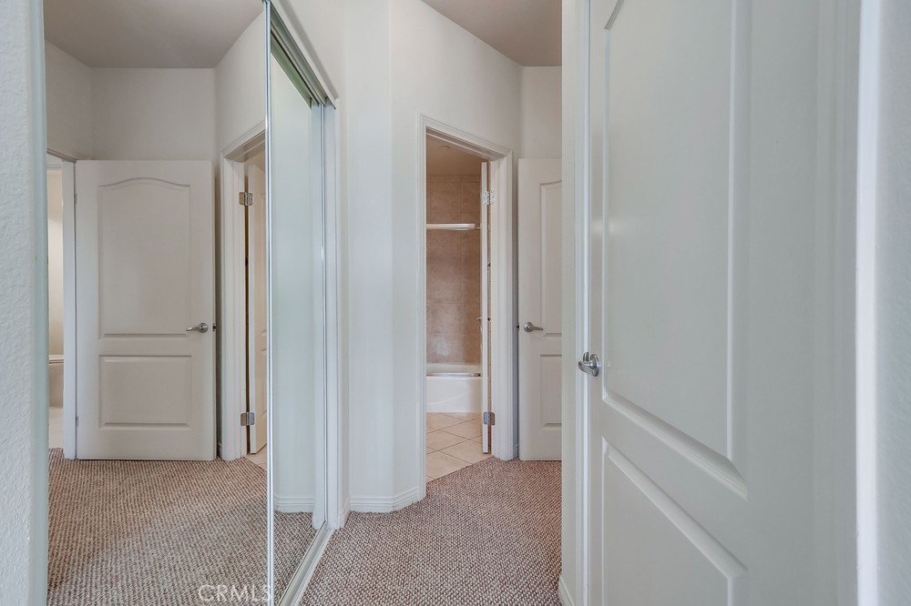 3120 Sepulveda Boulevard, Unit 412 Torrance, CA 90505 - Photo 27 of 40 a view of a hallway with closet and bathroom