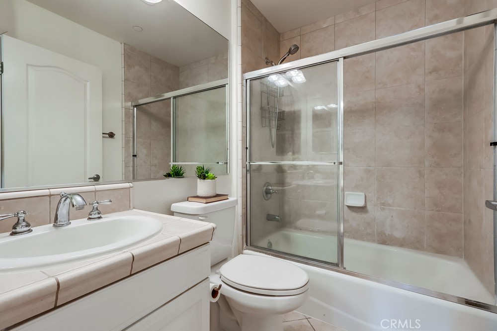 3120 Sepulveda Boulevard, Unit 412 Torrance, CA 90505 - Photo 30 of 40 a bathroom with a sink toilet and shower