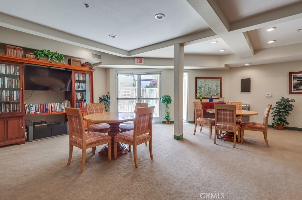 3120 Sepulveda Boulevard, Unit 412 Torrance, CA 90505 - Photo 32 of 40 a dining room with furniture and window
