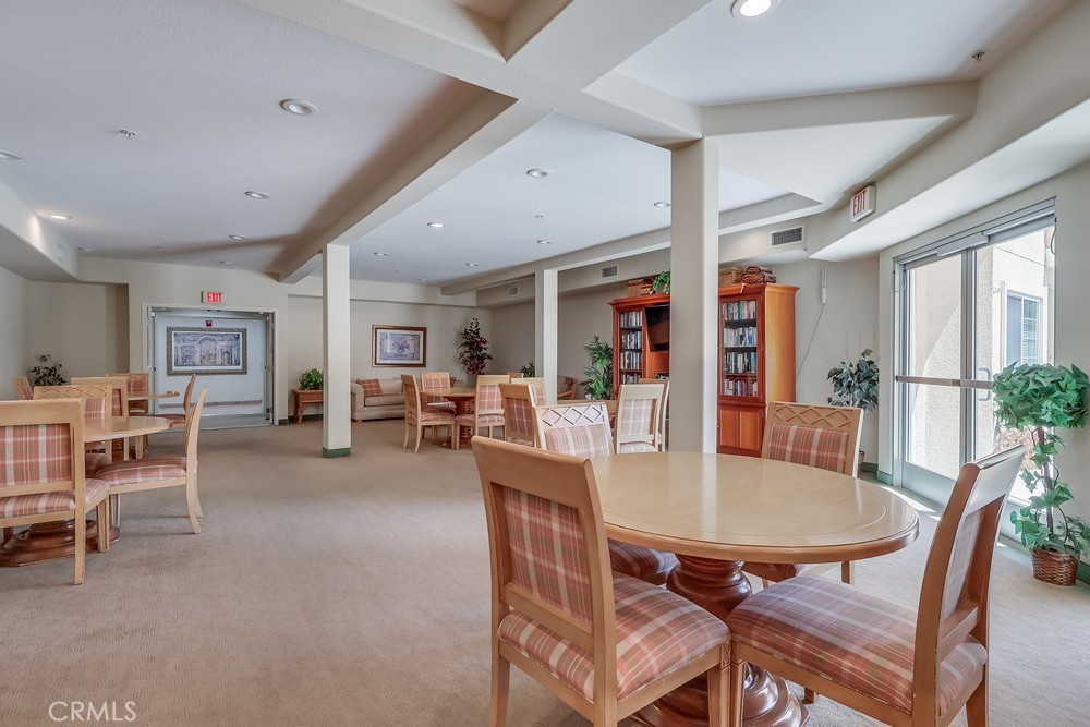 3120 Sepulveda Boulevard, Unit 412 Torrance, CA 90505 - Photo 33 of 40 a dining room with furniture and window