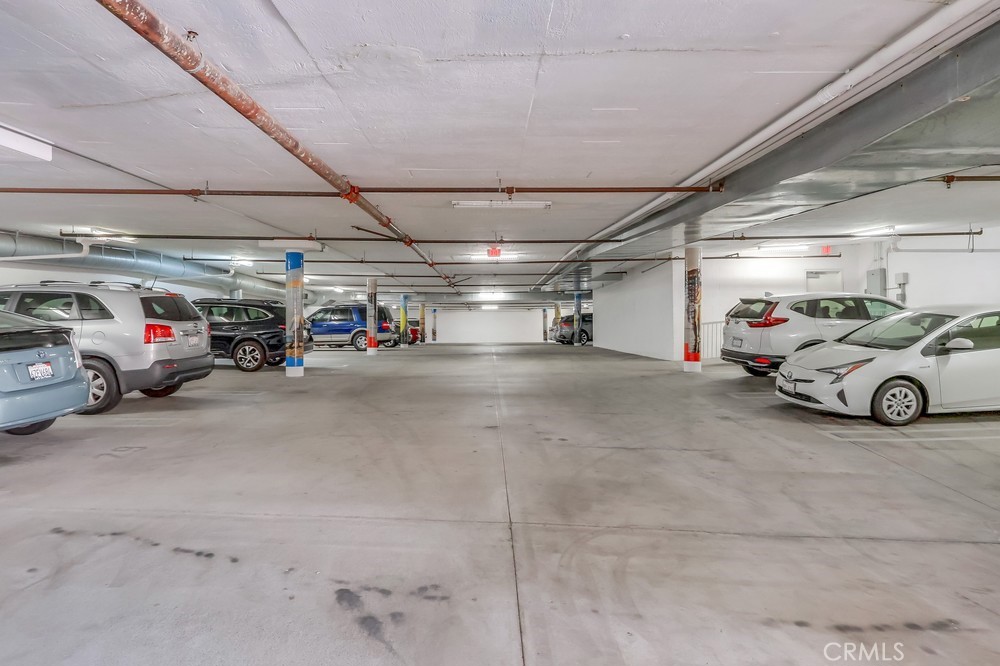 3120 Sepulveda Boulevard, Unit 412 Torrance, CA 90505 - Photo 37 of 40 a view of parking garage with cars