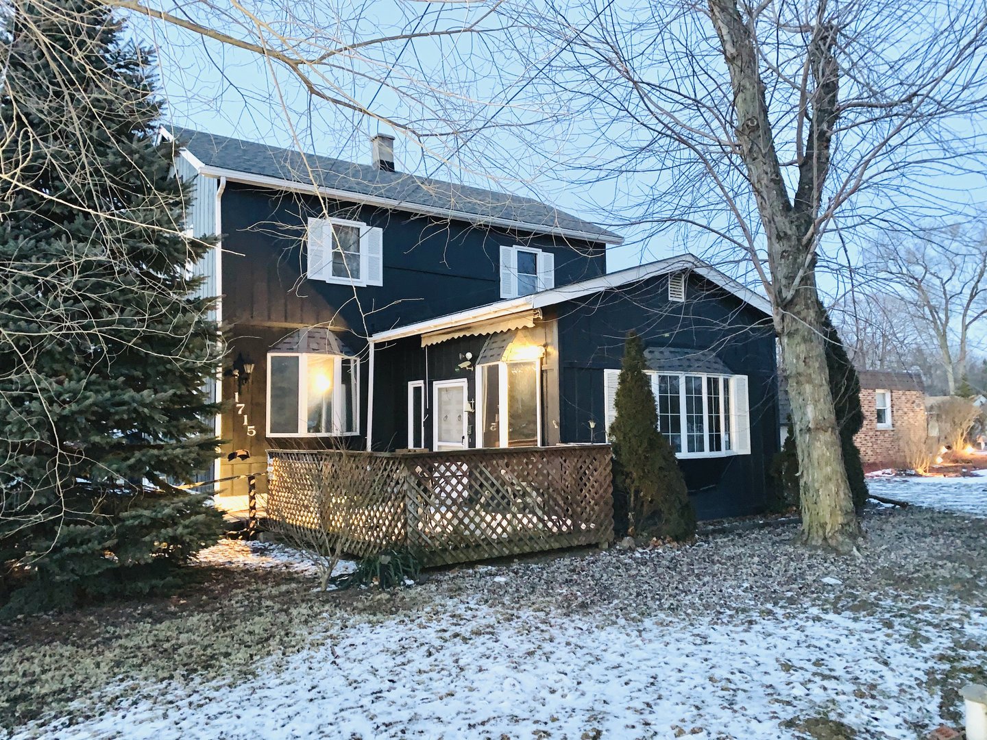 1715 Maple Road Joliet, IL 60432 - Photo 1 of 37 a front view of a house with a yard