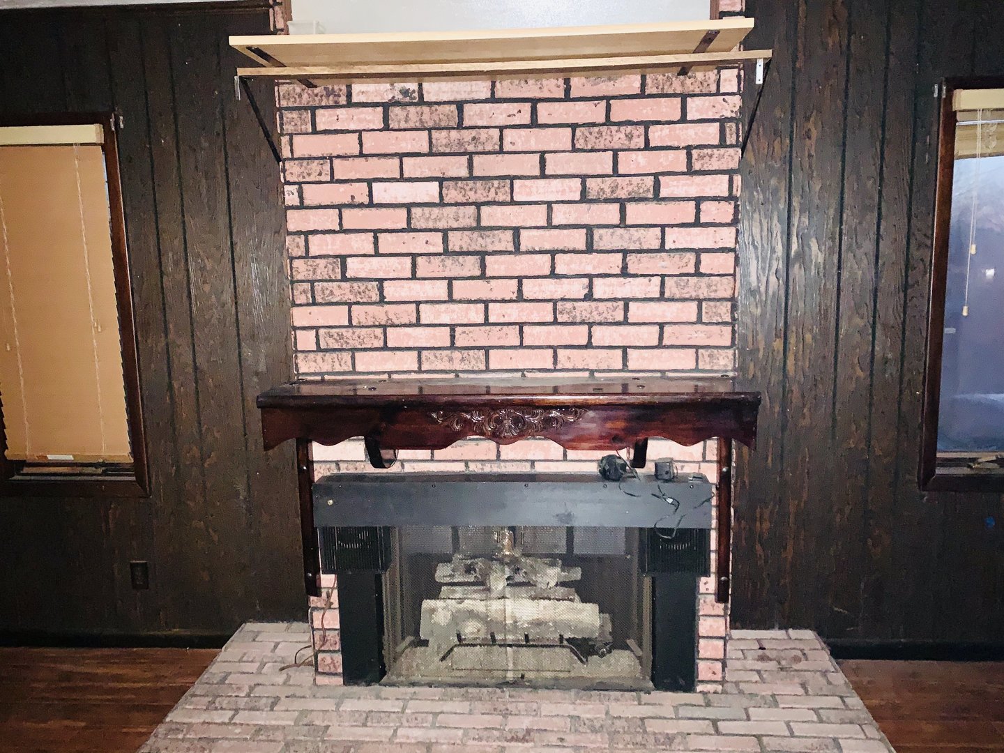 1715 Maple Road Joliet, IL 60432 - Photo 12 of 37 a room with a fireplace and a table