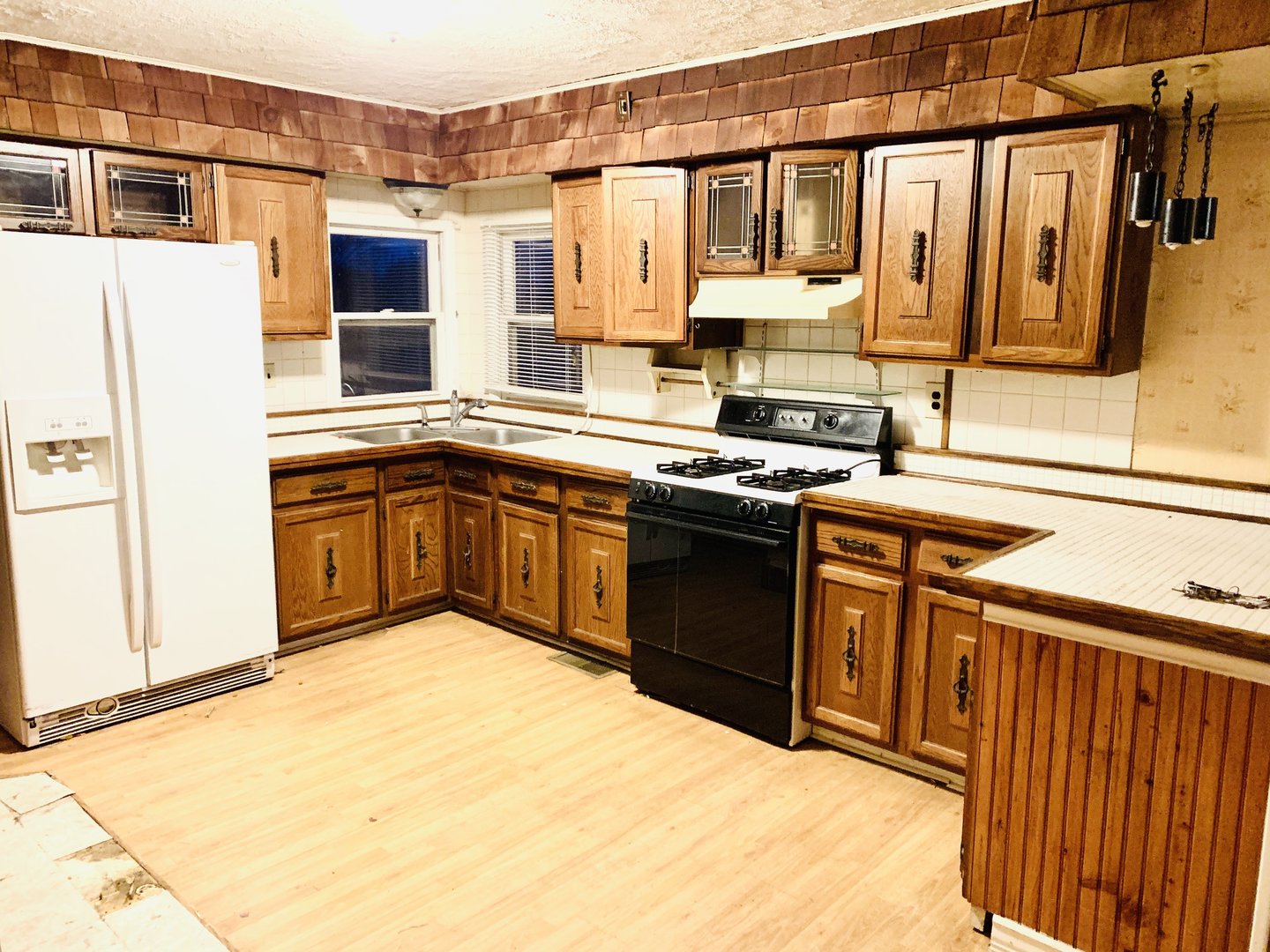 1715 Maple Road Joliet, IL 60432 - Photo 13 of 37 a kitchen with stainless steel appliances granite countertop a stove and a sink