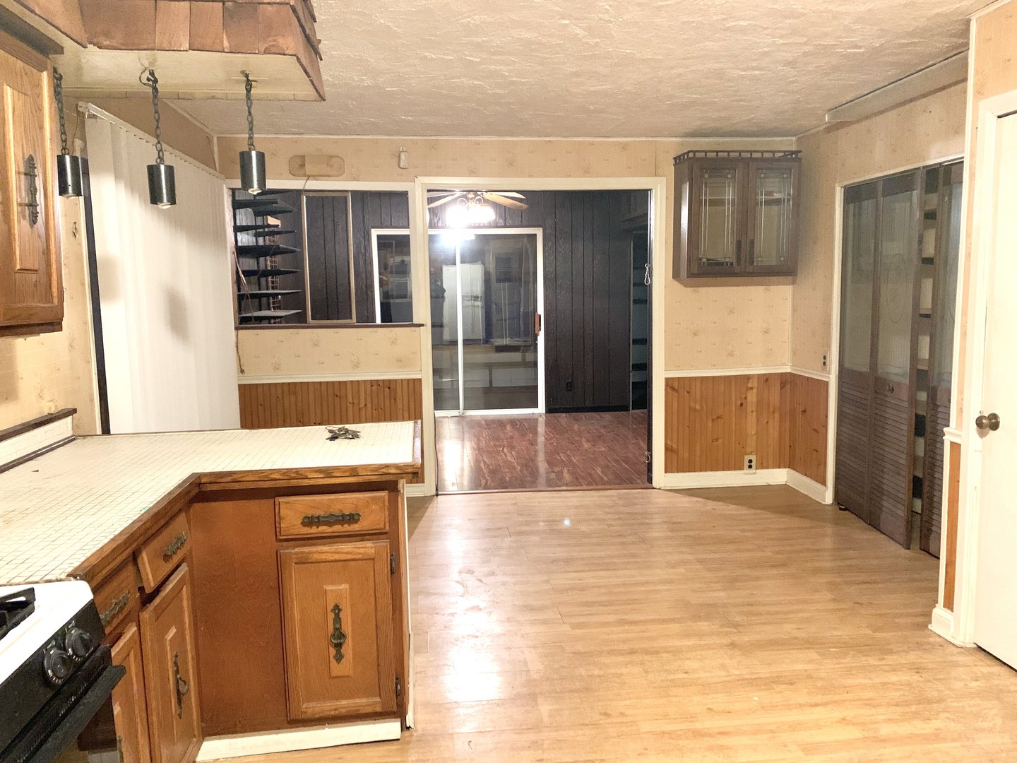 1715 Maple Road Joliet, IL 60432 - Photo 14 of 37 a view of a kitchen with stainless steel appliances kitchen island granite countertop a refrigerator and a sink
