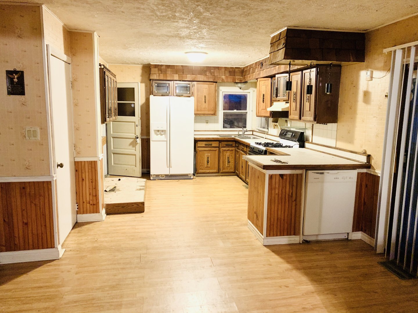 1715 Maple Road Joliet, IL 60432 - Photo 16 of 37 a kitchen with stainless steel appliances granite countertop a stove and a refrigerator