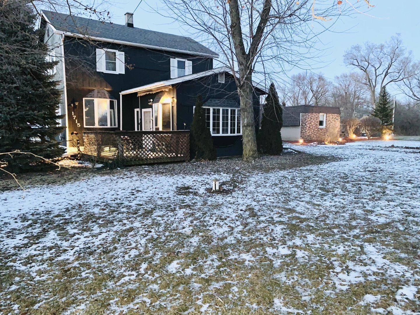 1715 Maple Road Joliet, IL 60432 - Photo 6 of 37 a front view of a house with a yard