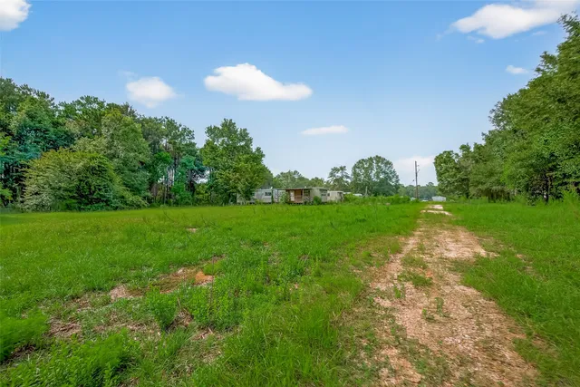 a view of a golf course with a lake