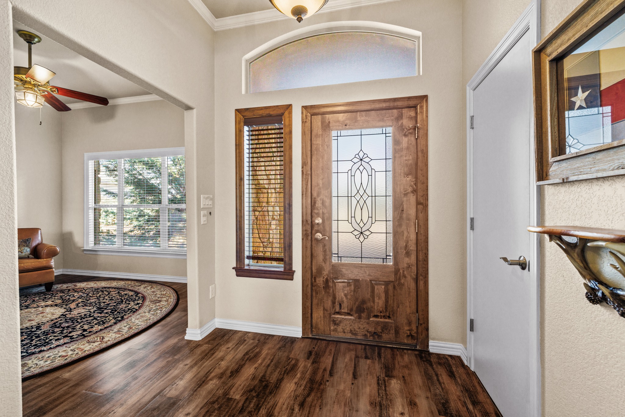 204 Skyline Road Georgetown, TX 78628 - Photo 11 of 40 Foyer featuring ornamental molding, a ceiling fan, and dark wood-style floors