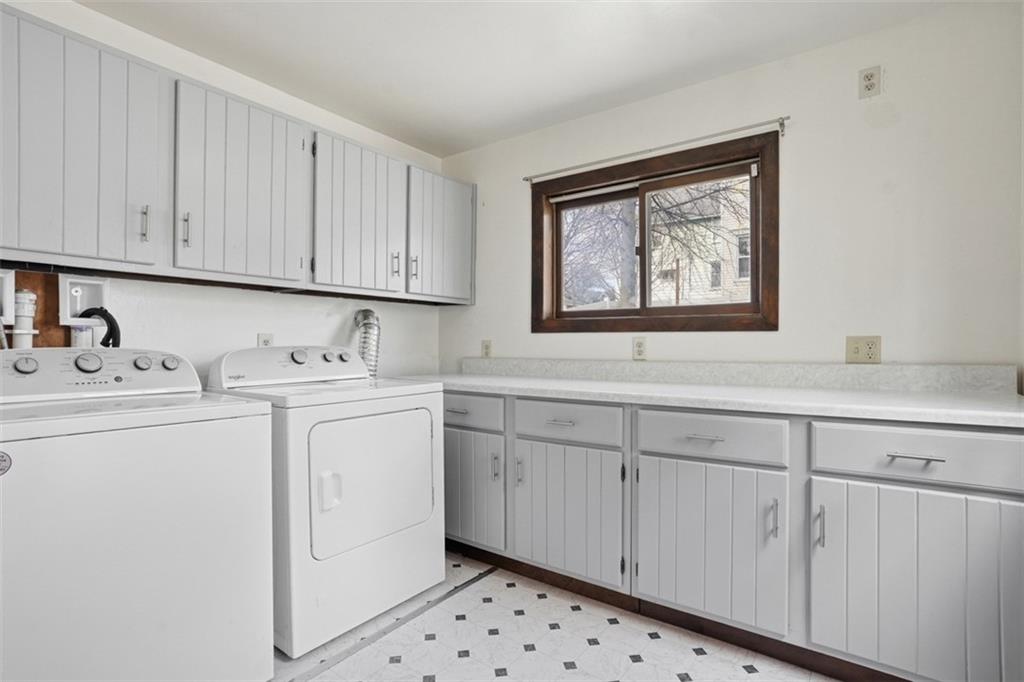 516 Eau Claire Street Butler, PA 16001 - Photo 19 of 41 a utility room with sink dryer and washer