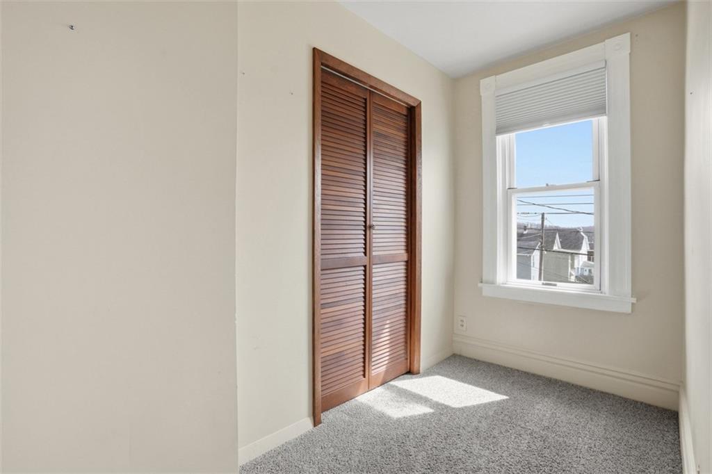 516 Eau Claire Street Butler, PA 16001 - Photo 28 of 41 a view of an empty room with windows