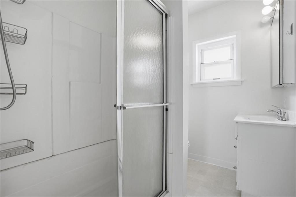 516 Eau Claire Street Butler, PA 16001 - Photo 29 of 41 a bathroom with a sink and mirror