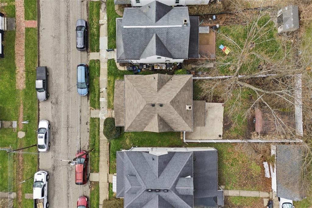 516 Eau Claire Street Butler, PA 16001 - Photo 39 of 41 an aerial view of a house with a garden and a building